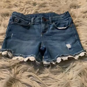 Old Navy distress look denim shorts. Girls size 5t.